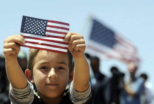 Child Holding US Flag