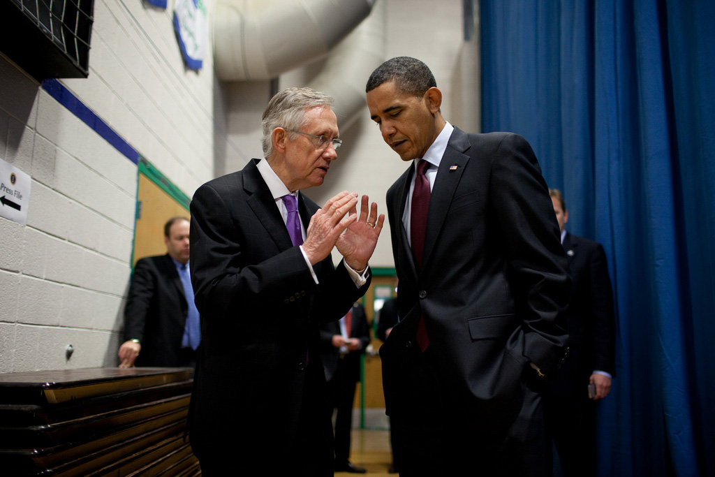President Barack Obama talks with Senate Majority Leader Harry Reid (D-Nev.)